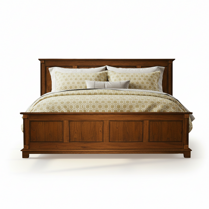 Wooden bed with white bedding and patterned pillows on a white background