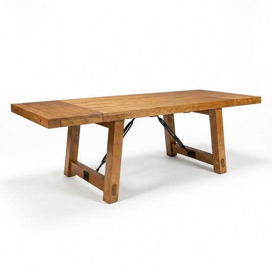 Wooden dining table on a white background