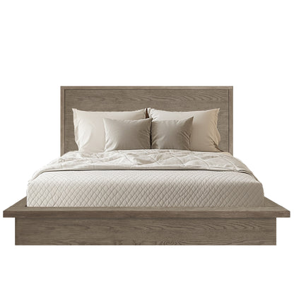 Wooden bed with beige bedding and pillows on a white background
