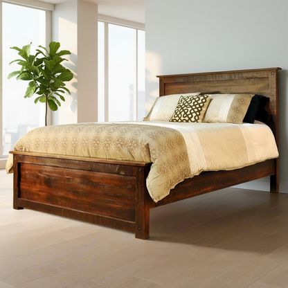 Wooden bed with beige bedding against a plain wall
