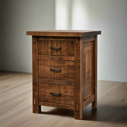 Wooden nightstand with three drawers on a white background