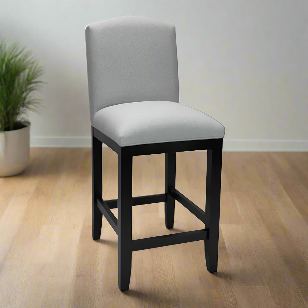 Bar stool with gray cushioned seat and backrest on a white background