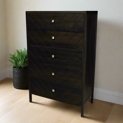 Dark wooden dresser with diamond pattern and silver handles on a white background