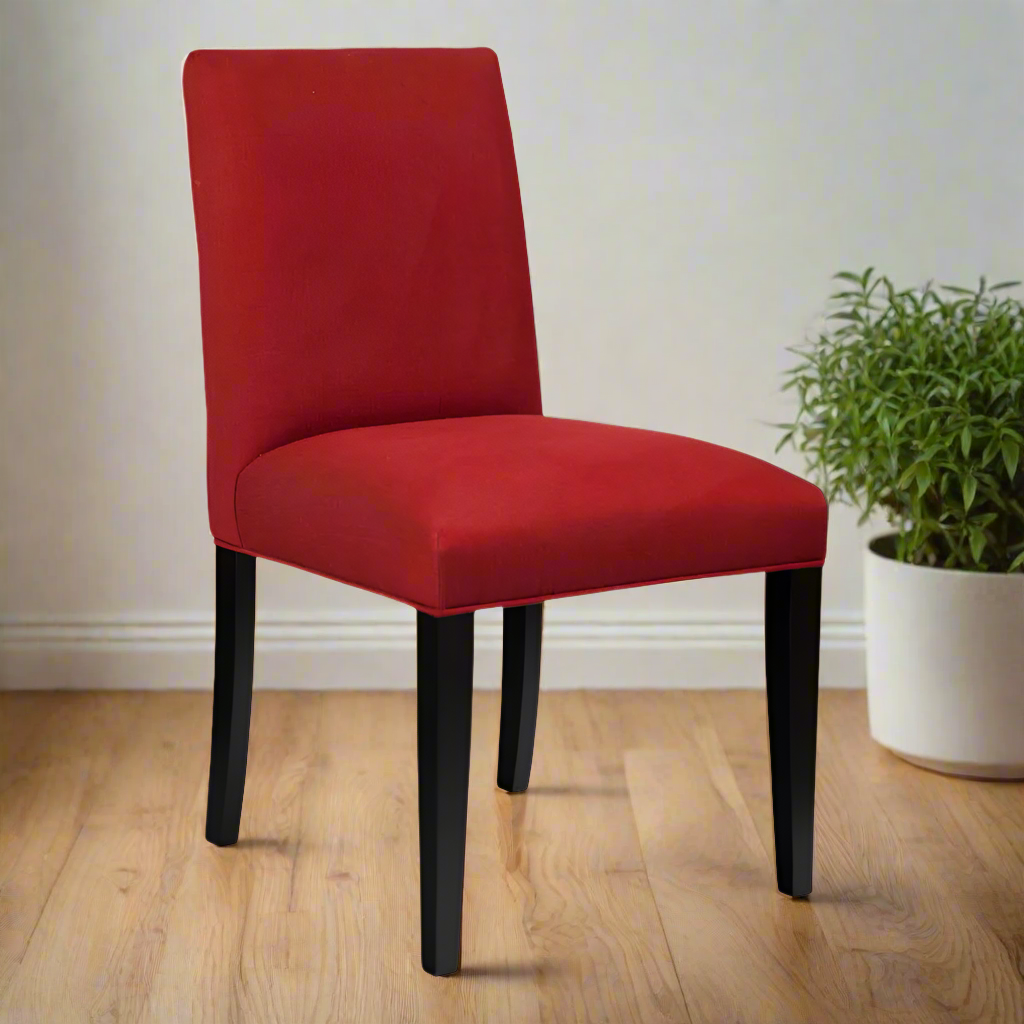 Red chair with black legs on a white background